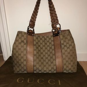 Gucci bag with braided handle. Sold with wallet